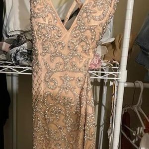 Perfect dress for HOCO or formal! Pink beautiful beaded.